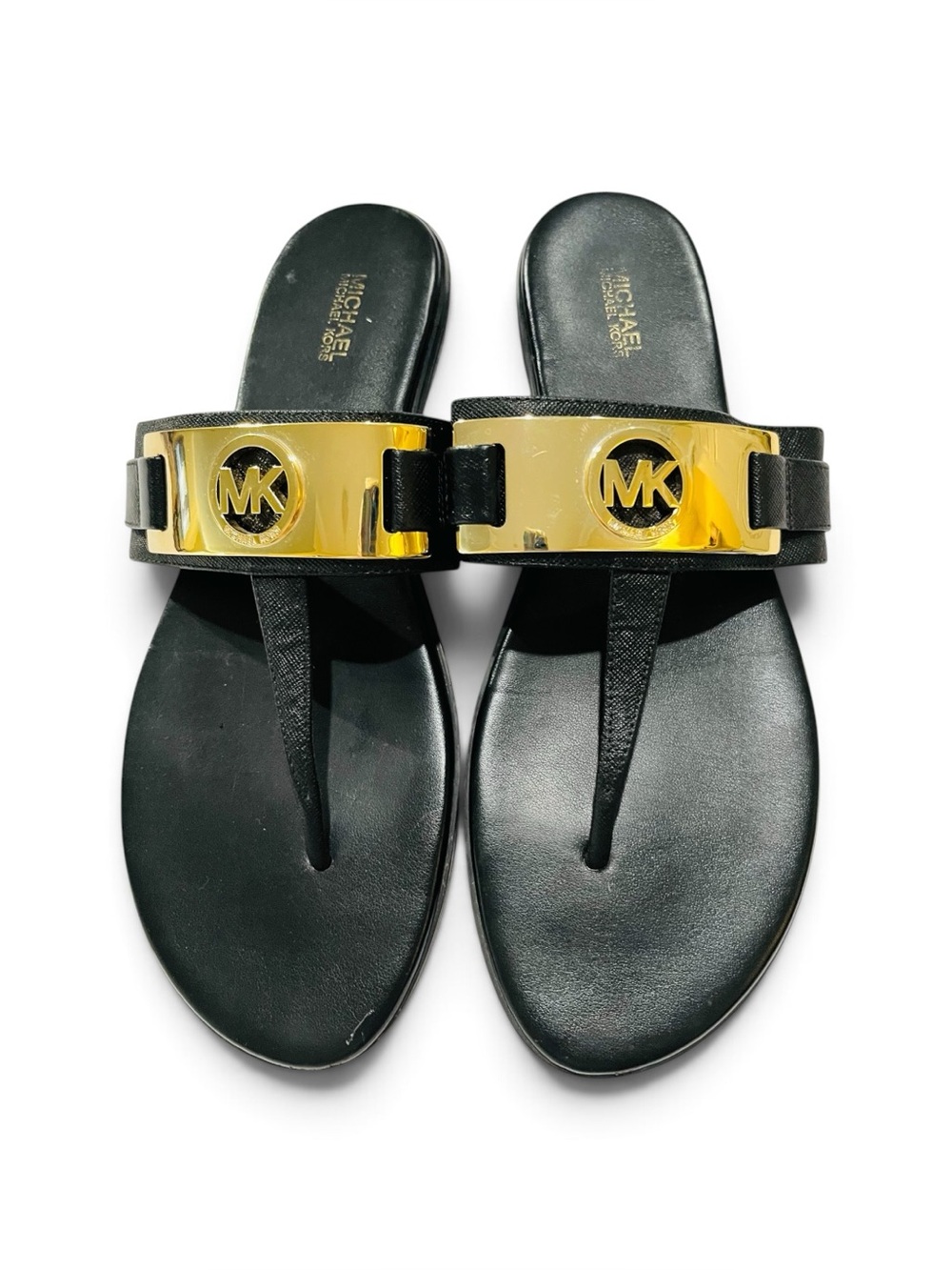 Michael Michael Kors Black Thong Sandals with Gold MK Plate.      SIZE 10M